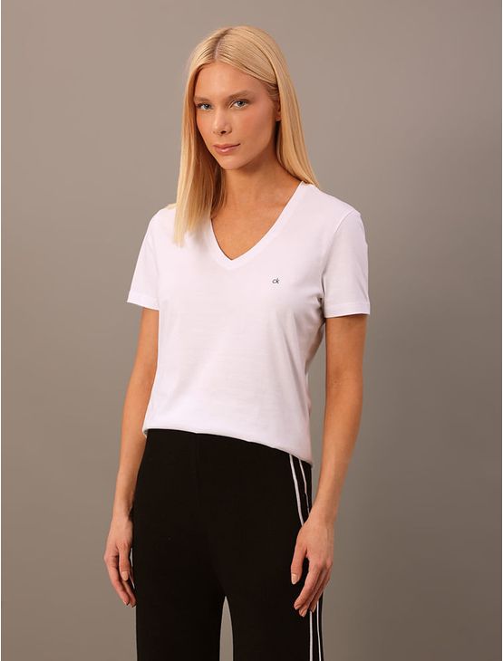 Camiseta Feminina Lisa Decote v Recorte Lateral Calvin Klein – Branco Camiseta Feminina Lisa Decote v Recorte Lateral Calvin Klein Branco Pp