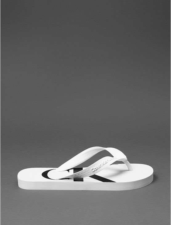 Chinelo Menino Logo Corrido Calvin Klein Jeans - Branco 2 Chinelo Menino Logo Corrido Calvin Klein Jeans Branco 2 31/32
